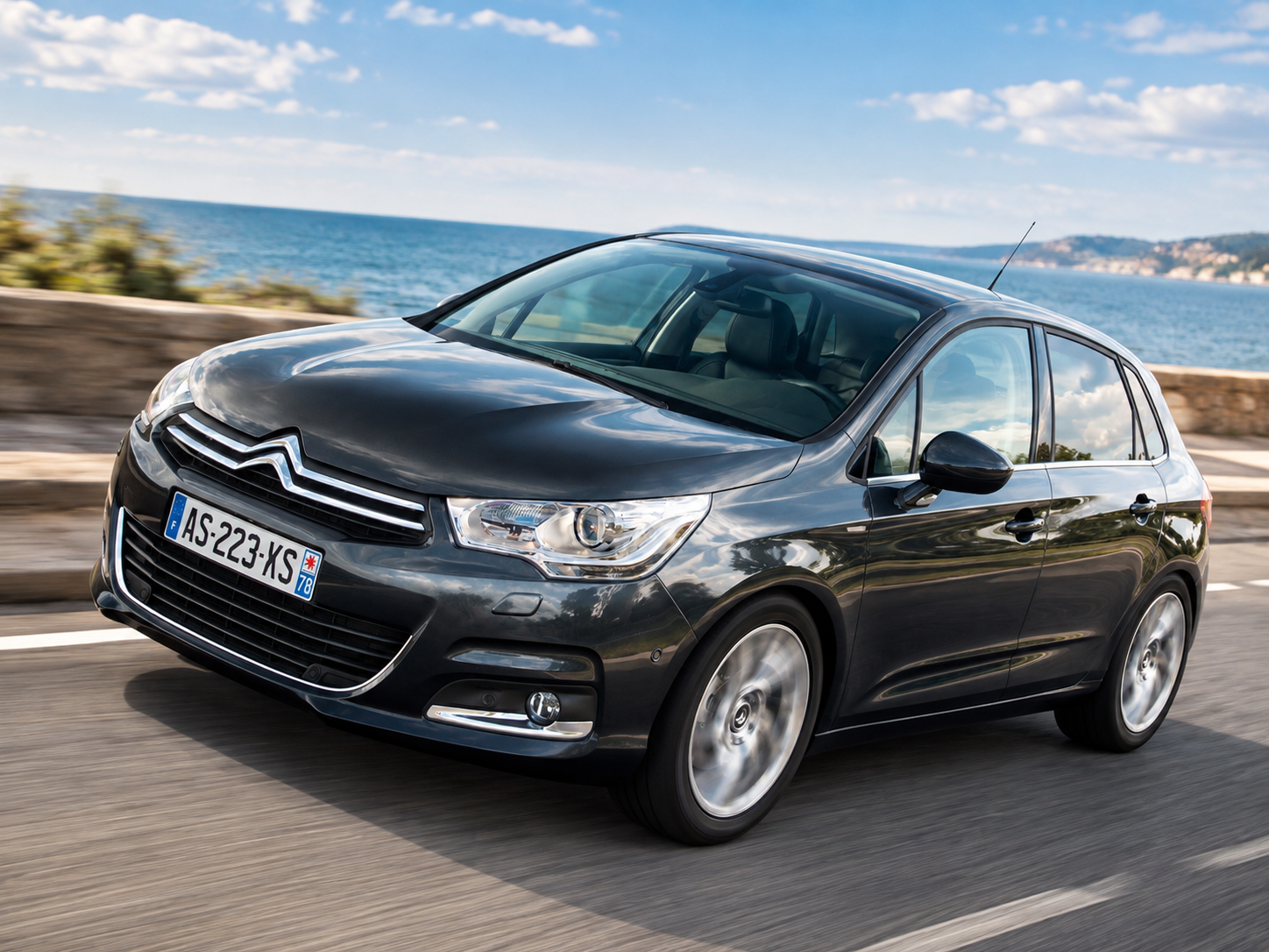 Citroën C4 II grise en roulage — acheter une C4 d'occasion fiable